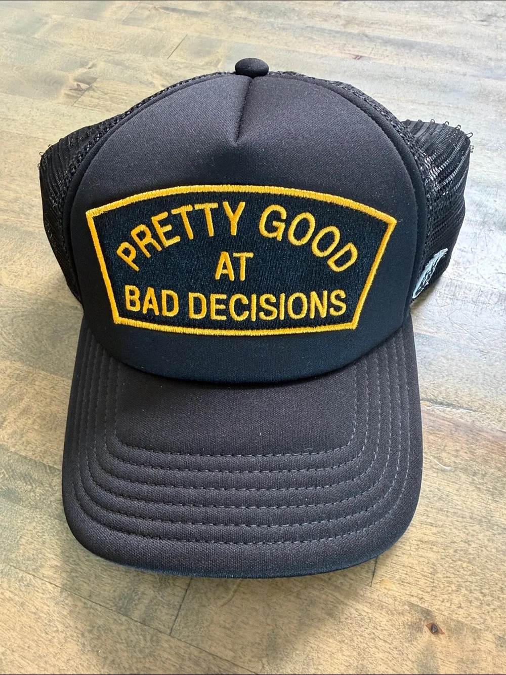 Cult of Individuality Black Trucker Hat “Pretty Good At Bad Decisions